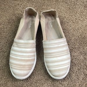 Clarks Tan Canvas Cloudsteppers slip-ons